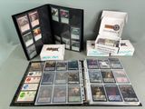 a lot of cards on the table and a box of them