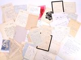 a pile of old letters and papers on a table