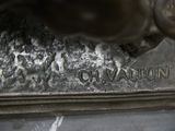 a close up of a statue of a horse on a table