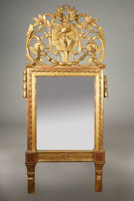 une image représentant un miroir doré sur lequel figure un oiseau