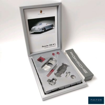 une photo d'une voiture argentée dans un coffret cadeau