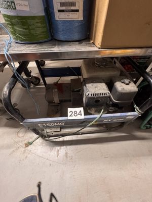 a machine that is sitting on a shelf in a room