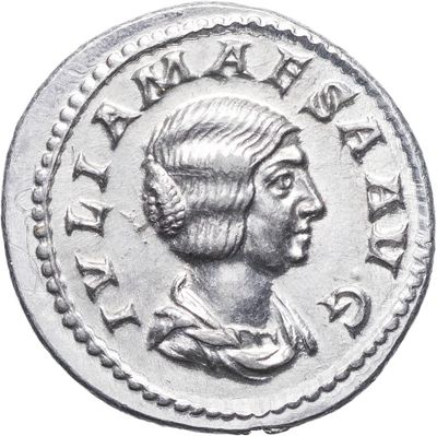 gros plan d'une pièce de monnaie sur laquelle figure une tête de femme