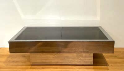 an image of a coffee table with a glass top