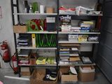 a room with a lot of boxes and supplies on the shelves