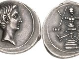 a close up of a coin with a woman on it