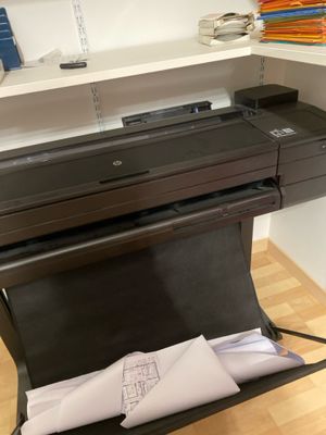 an image of a printer sitting on top of a desk