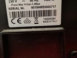 an image of a close up of a device with a barcode on it