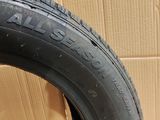 a close up of a tire on a cardboard box with a cardboard box in the background