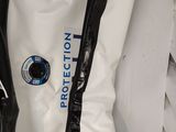 a close up of a white jacket with a blue logo on it