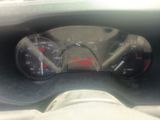 a close up of a car dashboard with a speedometer