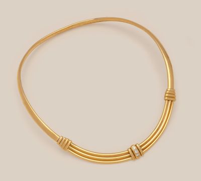a gold and diamond necklace, by cartier