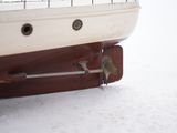a small bird that is sitting on a boat