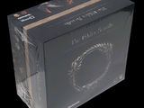 a box with a picture of a man holding a sword in it