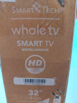 a cardboard box with a picture of a smart tv on it