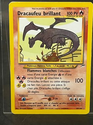a picture of a pokemon card with a dragon on it