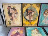 four framed pictures of women in art nouveau style