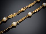 a pair of gold and pearl necklaces, by van cleef