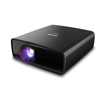 un projecteur noir posé sur une surface blanche