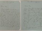 two old papers with handwriting on them sitting next to each other