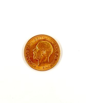 une pièce d'or sur laquelle figure le visage d'un homme