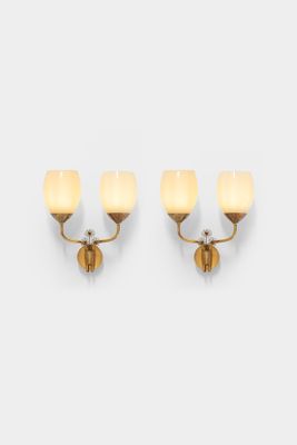 pair of sconces in the style of louis poulsier