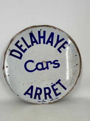 an image of a blue and white sign that says delahye cars arret