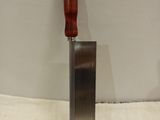 a knife that is sitting on top of a table