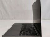 an open laptop computer sitting on top of a white surface
