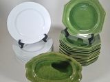 many plates stacked on top of each other on a table