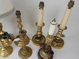 a lot of candles that are sitting on a table