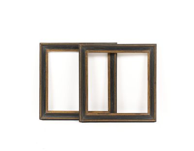 a pair of wooden frames with a white background
