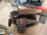 a tool that is sitting on the floor next to a tool holder
