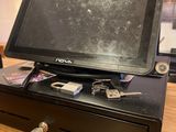 an image of a cash register on a wooden table