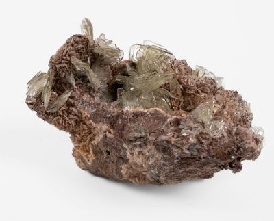 a small piece of rock with a lot of crystals on it