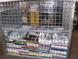 a metal cart with books on top of it in a warehouse
