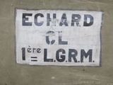 a sign on the back of a bag that says edward gl e g r r m