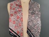 a woman ' s scarf on a mannequin mannequin mannequin mannequin mannequin mannequin mannequin mannequin mann