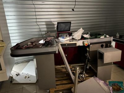 an image of a messy kitchen with a lot of clutter