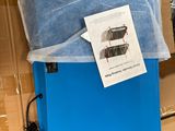 a blue box with a blue sheet on it and a blue sheet on top of it
