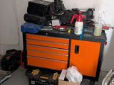 a room with a lot of clutter and tools on the floor