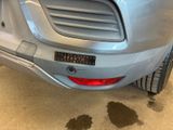 a close up of a car ' s rear bumper