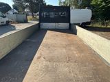 a truck that is parked on the side of the road