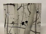 a picture of a picture of birds on a tree branch
