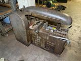 an old machine that is sitting in the garage