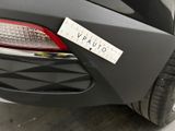 the rear end of a car with a sticker on it ' s bumper
