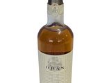 an image of a bottle of whisky on a white background