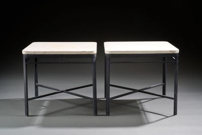 pair of black and white marble topped stools on a gray surface