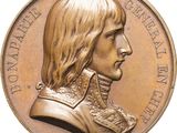 une image représentant une médaille de bronze à l'effigie d'un homme aux cheveux longs