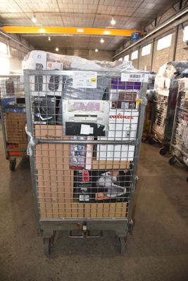 a large metal cart with many items in it